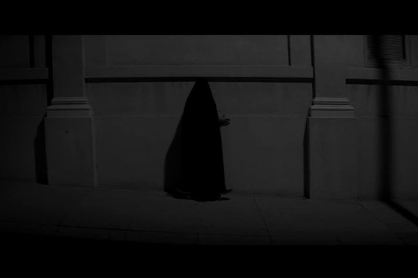 a girl walks home alone at night